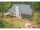 Charming home with screened porch, fire pit and wooded backyard offering serene outdoor living at 83 Shipp Cir, Hiram, GA 30141