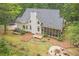 Charming home with screened porch, fire pit and wooded backyard offering serene outdoor living at 83 Shipp Cir, Hiram, GA 30141