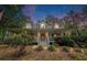 Charming home with a welcoming front porch, lush landscaping, and a serene setting at 83 Shipp Cir, Hiram, GA 30141