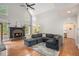 Bright and airy living room with a brick fireplace and views of the outdoors at 83 Shipp Cir, Hiram, GA 30141