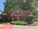 Baxley Point community entrance sign surrounded by manicured landscaping and colorful flowers at 1666 Baxley Pine Trce, Suwanee, GA 30024
