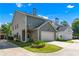 Exterior view of a two story home with a two car garage and nice landscaping at 1666 Baxley Pine Trce, Suwanee, GA 30024