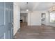 Bright, inviting living room with wood floors and elegant lighting, creating a welcoming atmosphere at 1666 Baxley Pine Trce, Suwanee, GA 30024
