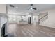 Open concept layout showcasing the kitchen, dining, and living areas, perfect for entertaining and daily living at 1666 Baxley Pine Trce, Suwanee, GA 30024