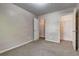 Neutral bedroom with carpet flooring and walk-in closet at 2289 Strathmoor Manor Dr, Lithonia, GA 30058