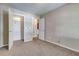 Neutral bedroom with carpet flooring and walk-in closet at 2289 Strathmoor Manor Dr, Lithonia, GA 30058