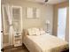 Charming bedroom featuring a bed with plush pillows and white decor, and luxury vinyl plank floor at 3046 Dobbs Way, East Point, GA 30344