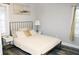 Cozy bedroom featuring a comfortable bed, bedside tables and soft decor at 3046 Dobbs Way, East Point, GA 30344