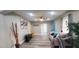 Bright living room with a modern couch and a vibrant view through to the entryway at 3046 Dobbs Way, East Point, GA 30344
