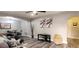 Stylish living room with a view of dining room and bathroom showcasing its open layout at 3046 Dobbs Way, East Point, GA 30344