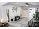 Spacious open layout with living and dining areas featuring gray walls and flooring at 3046 Dobbs Way, East Point, GA 30344