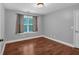 Bedroom featuring a wood floor, neutral wall paint and natural light from window at 345 Riverstone Dr, Hiram, GA 30141