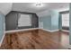Bonus room with wood flooring, dormer ceiling and multiple windows for natural light at 345 Riverstone Dr, Hiram, GA 30141