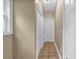 Bright hallway with tiled floor and neutral walls with white trim at 345 Riverstone Dr, Hiram, GA 30141