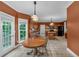 Eat-in kitchen features a breakfast nook, access to the backyard and stainless steel appliances at 345 Riverstone Dr, Hiram, GA 30141