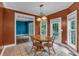 Charming eat-in kitchen with tile floors, access to the living room, and an outdoor patio at 345 Riverstone Dr, Hiram, GA 30141