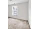 Bedroom with a window bringing in natural light at 4435 Grove Nw Dr, Acworth, GA 30101
