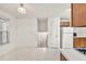 Bright kitchen featuring a window and a full suite of white appliances at 4435 Grove Nw Dr, Acworth, GA 30101