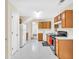 Functional kitchen with appliances, light cabinets, and bright lighting at 4435 Grove Nw Dr, Acworth, GA 30101
