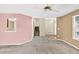 Inviting living room with natural light, staircase, and neutral tones at 4435 Grove Nw Dr, Acworth, GA 30101