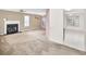 Spacious living room with fireplace and abundant natural light from windows at 4435 Grove Nw Dr, Acworth, GA 30101
