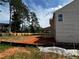 Spacious backyard and covered patio awaiting landscaping and outdoor enjoyment at 1716 Hickory Heights (Lot 2) Way, Acworth, GA 30102