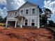 Charming two-story home with gray siding, white trim and a welcoming front porch at 1716 Hickory Heights (Lot 2) Way, Acworth, GA 30102