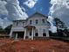 Charming two-story home with gray siding, white trim and a welcoming front porch at 1716 Hickory Heights (Lot 2) Way, Acworth, GA 30102
