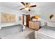 Bedroom with carpet, ceiling fan, and two twin beds at 217 Cedar Trl, Jonesboro, GA 30238