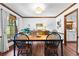 Elegant dining room with wood flooring and natural light at 217 Cedar Trl, Jonesboro, GA 30238