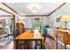 Light-filled dining room with wood flooring at 217 Cedar Trl, Jonesboro, GA 30238