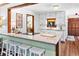 Bright kitchen island with white cabinets and stainless steel appliances at 217 Cedar Trl, Jonesboro, GA 30238
