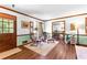 Cozy living room with hardwood floors and comfortable seating arrangement, bathed in natural light at 217 Cedar Trl, Jonesboro, GA 30238