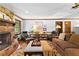 Relaxing living room features stone fireplace, plush seating and an open floor plan at 217 Cedar Trl, Jonesboro, GA 30238