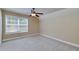 Cozy bedroom offering a window providing natural light, perfect for restful nights at 7804 Gusty Trl, Douglasville, GA 30135