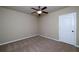 Bedroom featuring neutral walls, carpeted floor, and a ceiling fan at 7804 Gusty Trl, Douglasville, GA 30135