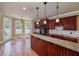 Kitchen featuring granite counters, stainless steel appliances, and a breakfast bar area at 7804 Gusty Trl, Douglasville, GA 30135