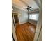 Bedroom with hardwood floors, a ceiling fan and large window at 1177 Baker Ln, Marietta, GA 30062