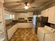Well-equipped kitchen with stainless steel refrigerator and granite countertops at 1177 Baker Ln, Marietta, GA 30062