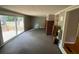 Cozy living room with fireplace, sliding doors leading to outdoor deck at 1177 Baker Ln, Marietta, GA 30062