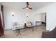 Cozy living room with light-colored sofa, wood-look flooring, and modern lighting at 3185 Perch Sw Dr, Marietta, GA 30008