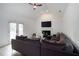 Spacious living room with vaulted ceilings, fireplace, and access to the outdoor deck at 3185 Perch Sw Dr, Marietta, GA 30008