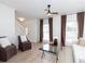 Comfortable living room with neutral tones, modern fixtures, and access to the staircase at 3185 Perch Sw Dr, Marietta, GA 30008