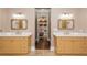 Dual vanity sinks in a shared bathroom featuring neutral walls and modern lighting at 3280 Stillhouse Se Ln # 108, Atlanta, GA 30339