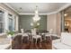 Dining room featuring a chandelier, hardwood floors, and seating for four at 3280 Stillhouse Se Ln # 108, Atlanta, GA 30339