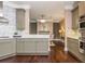 Well-appointed kitchen featuring sleek countertops, modern cabinetry, and stainless steel appliances, creating a stylish cooking space at 3280 Stillhouse Se Ln # 108, Atlanta, GA 30339