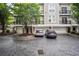 Apartment complex with multi-car garages and mature trees for a picturesque setting at 4248 River Green Nw Dr # 310, Atlanta, GA 30327
