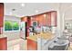Modern kitchen featuring granite countertops, stainless steel appliances, and ample cabinet space for storage at 4248 River Green Nw Dr # 310, Atlanta, GA 30327