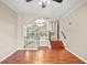 View of the living room, which features wood floors, neutral paint and natural light at 4248 River Green Nw Dr # 310, Atlanta, GA 30327