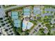 An aerial view of community amenities including tennis courts, swimming pool, and clubhouse at 7615 Laurel Oak Dr, Suwanee, GA 30024